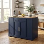 Navy blue kitchen sideboard buffet cabinet with light wood top and gold handles in modern bright kitchen interior