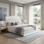 Modern white velvet upholstered bed frame with tufted headboard and built-in LED lighting in a luxury bedroom setting, manufactured by MMK Furniture Makers.