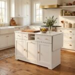 White kitchen island storage cabinet with folding drop-leaf extension and brass hardware by MMK Furniture Makers