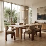 Modern solid ash wood dining chair HEFTCH-8155 with textured fabric upholstery in an upscale dining room setting by MMK Furniture Makers.