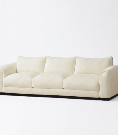 1.Front-view-of-a-luxurious-modern-cream-3-seater-sofa-with-a-dark-wood-base-isolated-on-a-clean-white-background-manufactured-by-MMK-Furniture-Makers.