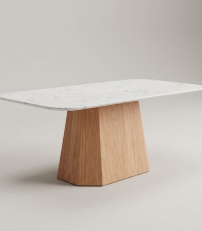 Modern-dining-table-with-Calacatta-white-stone-top-and-faceted-oak-pedestal-base-by-MMK-Furniture-Makers.
