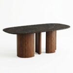 Modern-oval-dining-table-with-fluted-walnut-base-and-dark-faux-stone-top-in-an-upscale-dining-room.