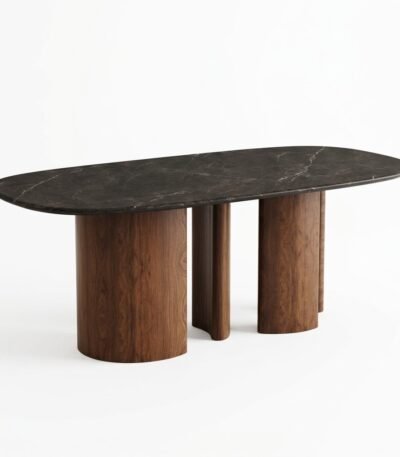 Modern-oval-dining-table-with-fluted-walnut-base-and-dark-faux-stone-top-in-an-upscale-dining-room.