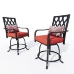 Pair-of-outdoor-swivel-bar-stools-with-red-cushions-on-poolside-patio.