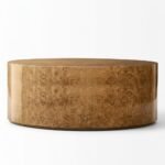 Side-view-of-a-round-burl-wood-drum-coffee-table-with-a-hSide-view-of-a-round-burl-wood-drum-coffee-table-with-a-high-gloss-finish.igh-gloss-finish.