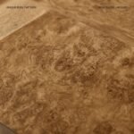 A-close-up-view-showing-the-intricate-natural-patterns-and-high-gloss-finish-of-the-burl-wood-veneer.