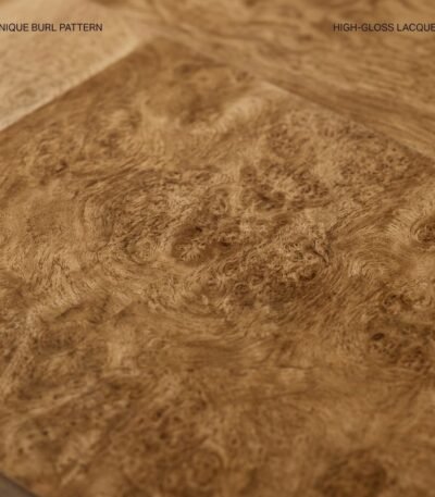 A-close-up-view-showing-the-intricate-natural-patterns-and-high-gloss-finish-of-the-burl-wood-veneer.