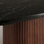 Close-up-details-of-scratch-resistant-black-faux-marble-and-precision-fluted-solid-wood-veneer.