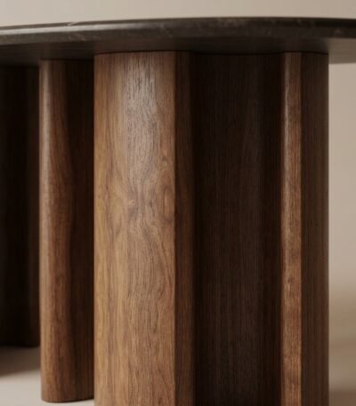 Close-up-of-intricate-fluted-walnut-wood-grain-on-a-table-base-showing-different-flute-diameters.