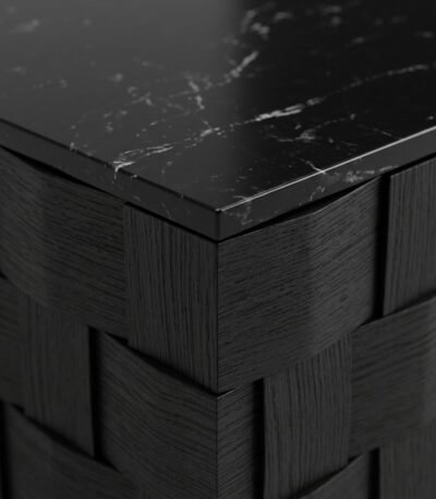 Close-up-texture-detail-of-black-artificial-marble-tabletop-and-staggered-black-red-oak-wood-veneer-relief-panels