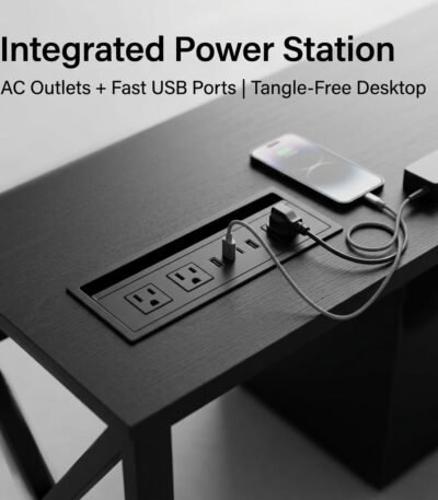 Desktop-close-up-showing-recessed-power-outlets-and-USB-ports-charging-devices.
