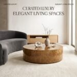 A-round-burl-wood-coffee-table-styled-in-a-sophisticated-living-room-with-a-vase.