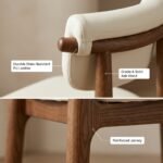 Close-up-of-solid-ash-wood-grain-and-beige-leather-stitching.