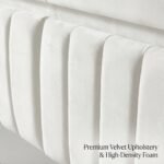 Close-up-of-white-vertical-stitched-velvet-upholstered-headboard.
