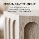 Detail-of-natural-wood-grain-and-arched-carvings-on-solid-wood-table.