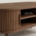 Detailed-close-up-of-a-tambour-coffee-table-door-sliding-highlighting-the-smooth-mechanism-and-wood-texture.