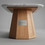 Heavy-duty-faceted-geometric-pedestal-base-in-cathedral-red-oak-veneer-for-contract-dining-table.