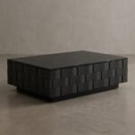 Side-low-angle-view-showing-the-sturdy-recessed-plinth-base-and-staggered-block-structure-of-the-black-coffee-table.