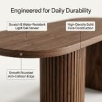 Close-up-of-light-oak-wood-grain-texture-rounded-tabletop-edge-and-gold-hardware.