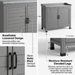 Detail-of-ventilated-louvered-door-slats-matte-black-handles-and-elevated-moisture-resistant-feet.