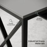 Macro-detail-of-the-powder-coated-metal-X-frame-leg-and-PVC-edge-banding-on-the-durable-L-shaped-desk.