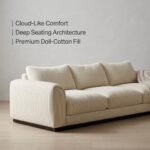 5.Side-profile-angle-highlighting-the-deep-seating-area-thick-doll-cotton-backrest-cushions-and-ergonomic-design-of-the-cream-sofa