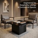 Square-black-high-gloss-coffee-table-in-an-upscale-hotel-lounge-setting.