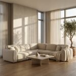 6.beige-modular-corner-sectional-sofa-styled-in-a-sun-drenched-organic-modern-luxury-living-room-with-travertine-accents.