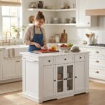Wholesale modern white kitchen island storage cabinet with drawers and glass doors in a bright home kitchen, by MMK Furniture Makers