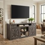 Rustic dark gray wood TV stand with geometric cabinet doors and open shelves in modern farmhouse living room by MMK Furniture Makers