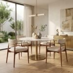 Four MMK custom modern upholstered dining chairs with brass arm accents around a marble dining table in a luxury home