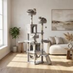 Multi-tier grey plush cat tree tower with scratching posts and condo perches in a modern living room by MMK Furniture Makers